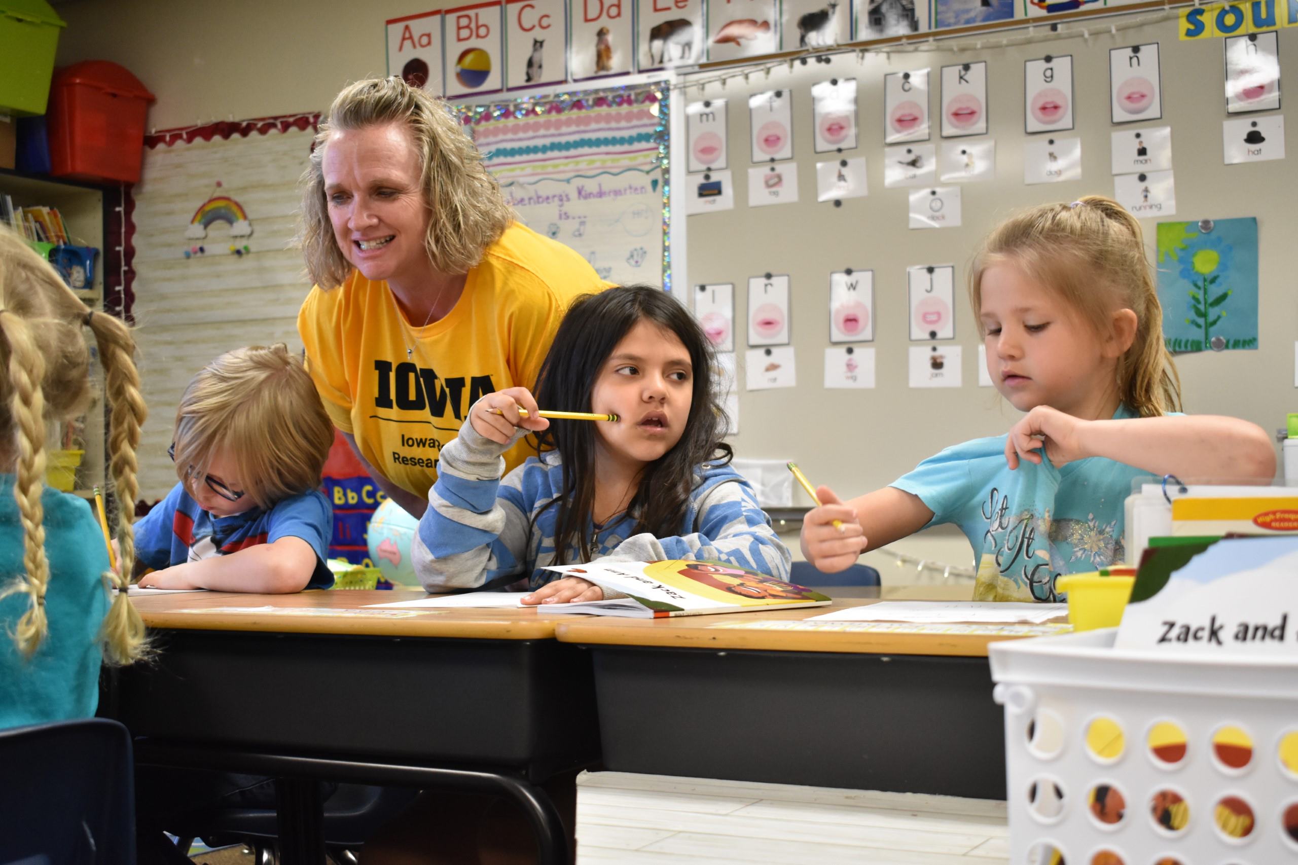 IRRC Assistant Director for Education and Outreach works with elementary students in a classroom