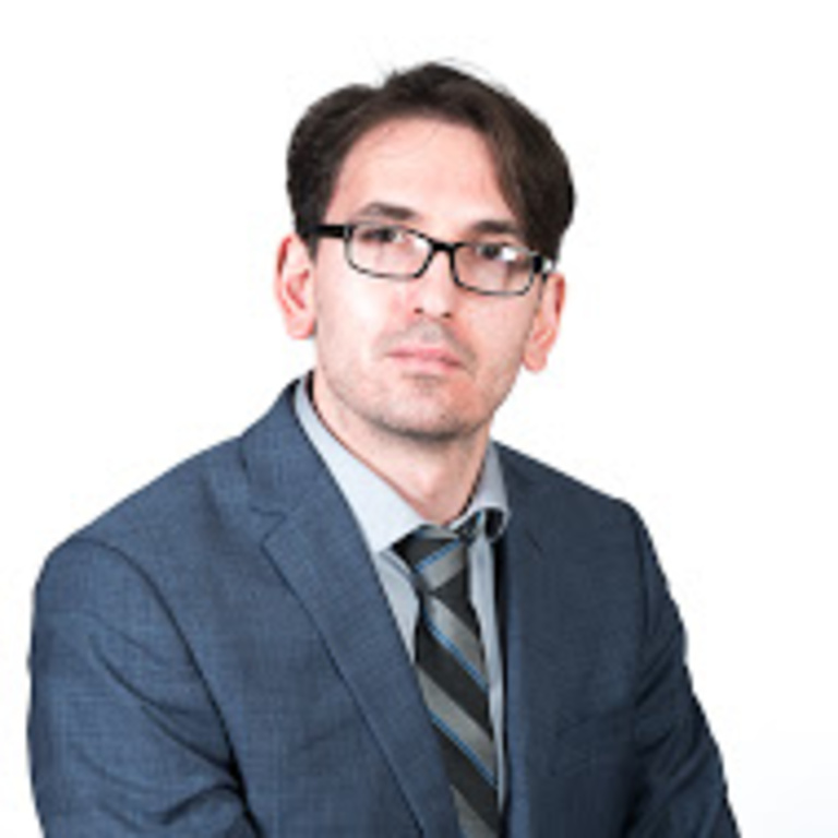 Professional headshot of Seth King