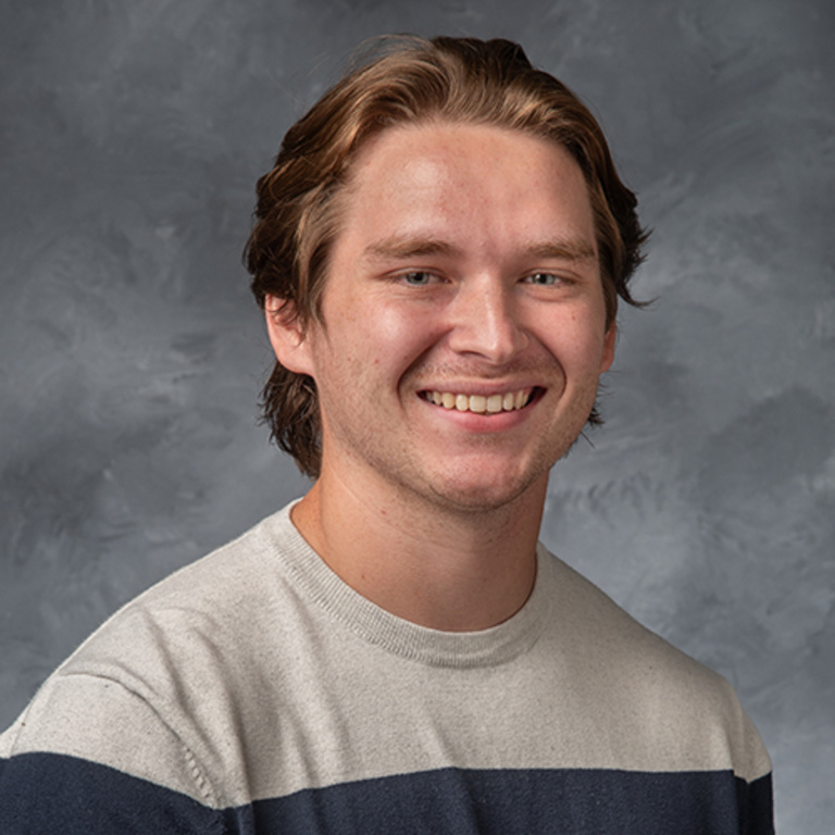 Professional headshot of graduate assistant Casey Coghlan