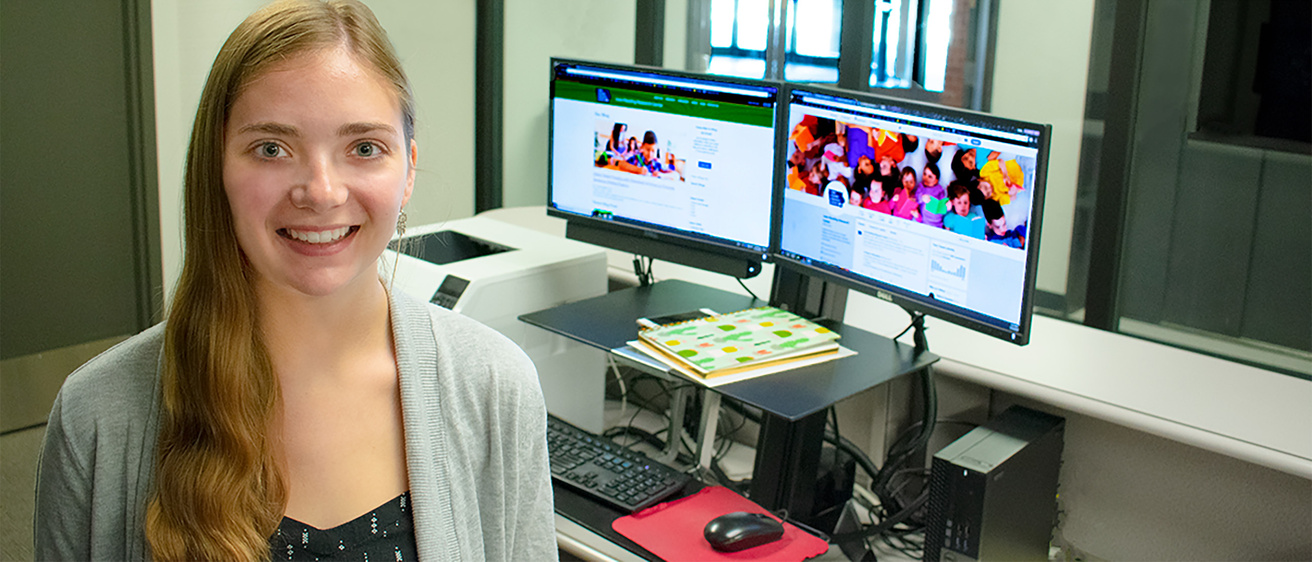 woman smiles at camera 