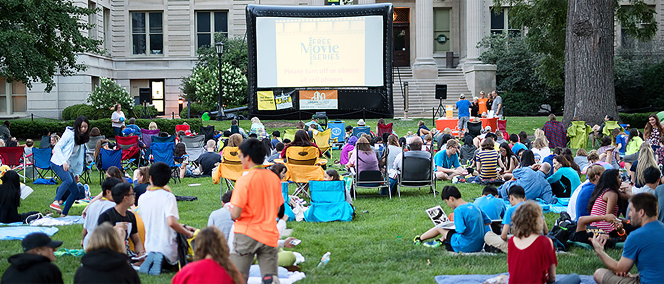 community gathers for outdoor movie night