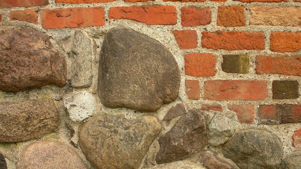 Stones and brick as the foundation of a building