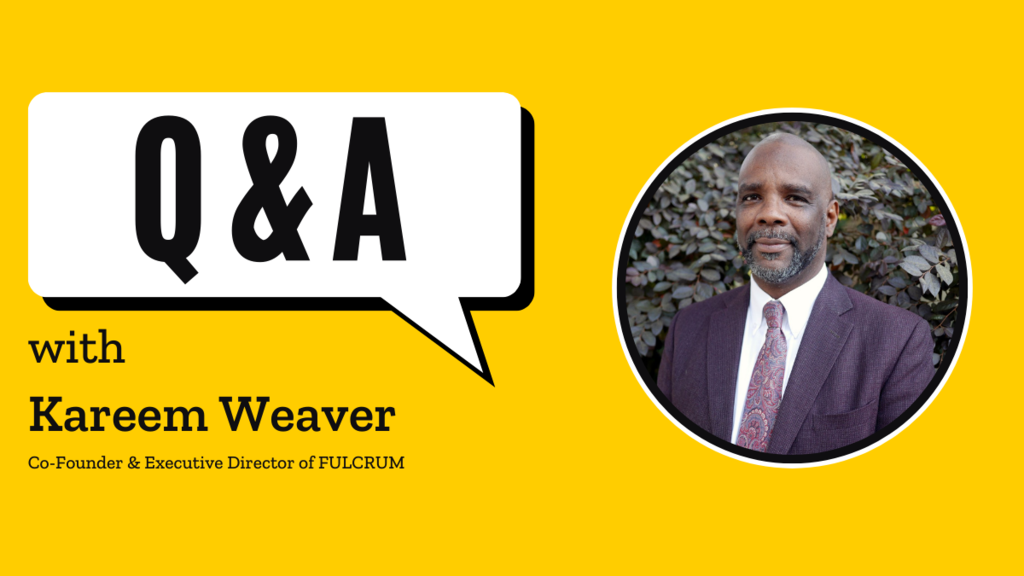 A speech bubble on a gold background reading "Q&A," below which is the text "with Kareem Weaver." Pictured is an adult man wearing a suit and tie.