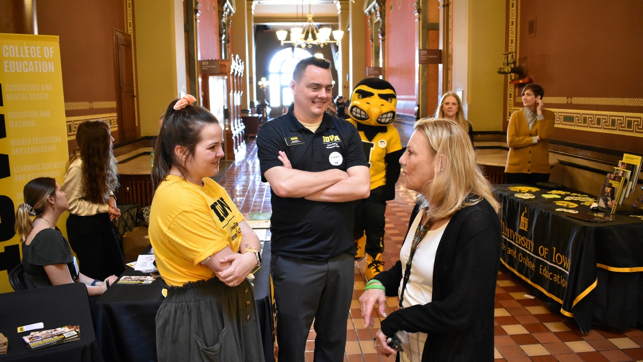 IRRC Staff chat at the Capitol Building in Des Moines during the 2023 Hawkeye Caucus